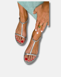 Sandalias planas metálicas con tira en T
