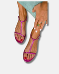 Sandalias planas metálicas con tira en T