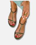 Sandalias planas metálicas con tira en T